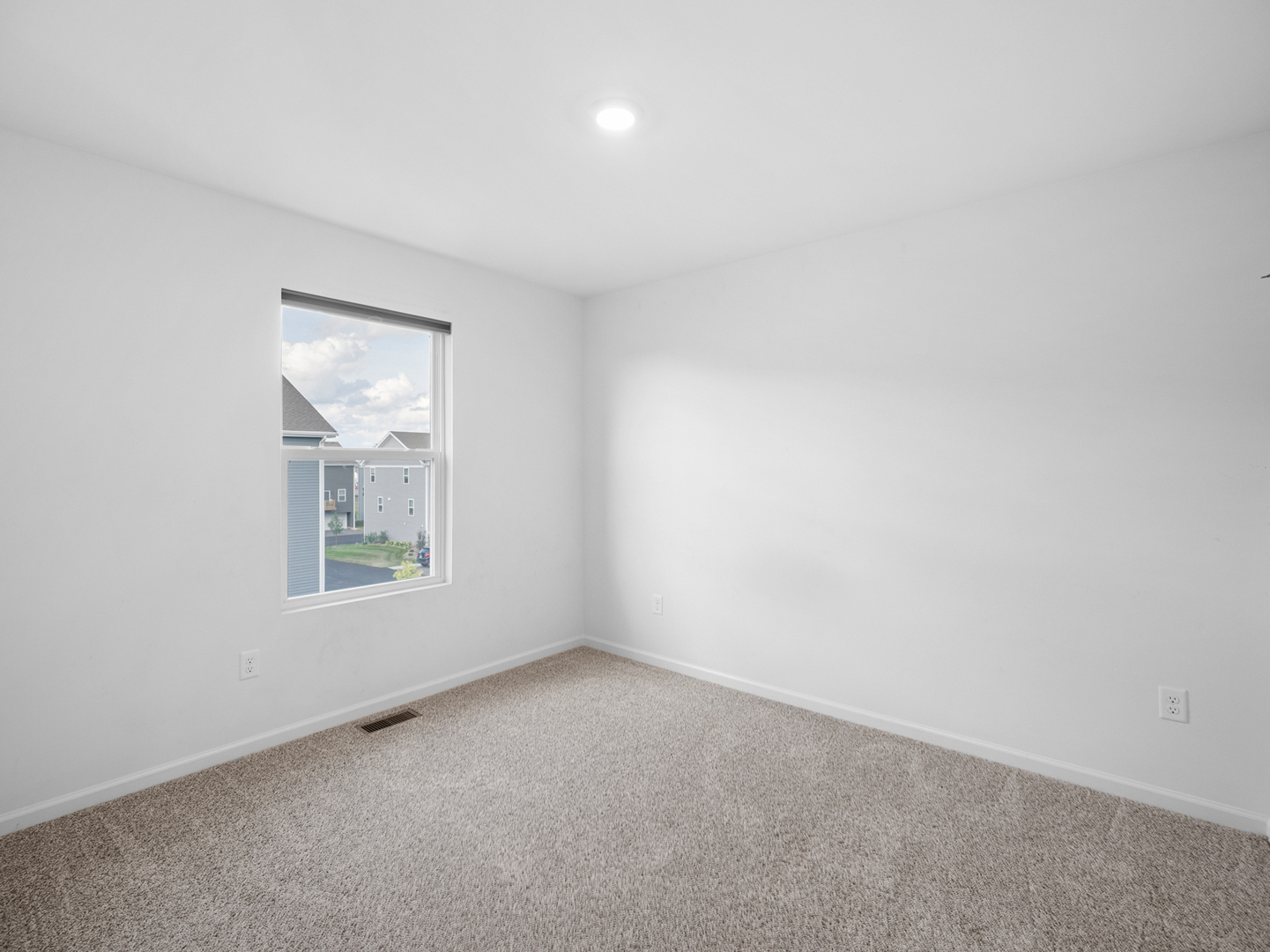 1533 Yosemite Way Pingree Grove, IL 60140 - Photo 10 of 17 an empty room with windows and closet