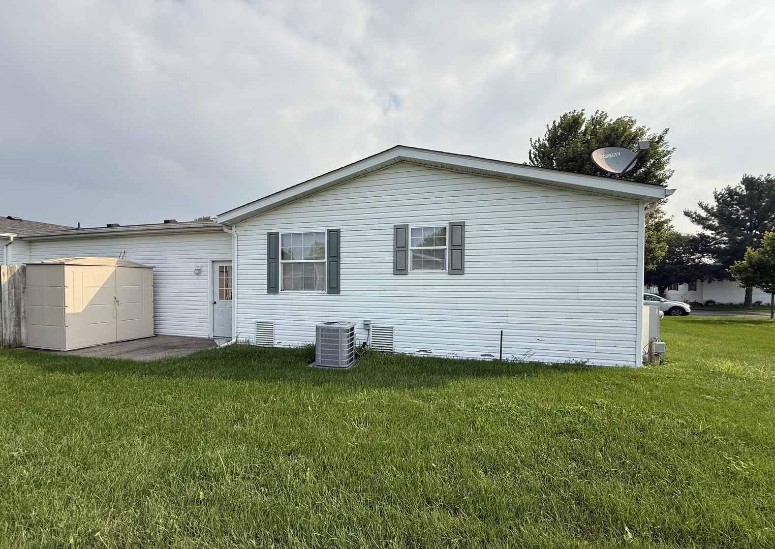 461 Meadowlark Circle, Unit A Sandwich, IL 60548 - Photo 24 of 28 a house that has a backyard