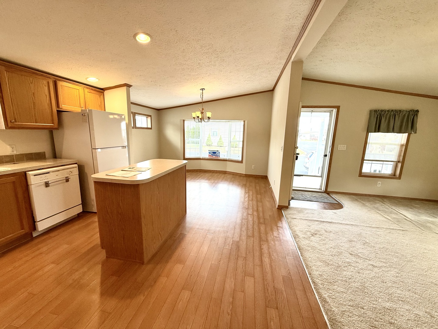 461 Meadowlark Circle, Unit A Sandwich, IL 60548 - Photo 28 of 28 a view of a kitchen with furniture and wooden floor