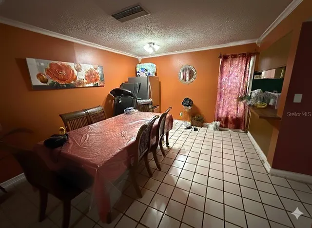 a dining room with furniture