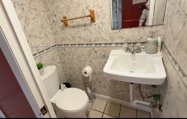 a bathroom with a sink and a toilet