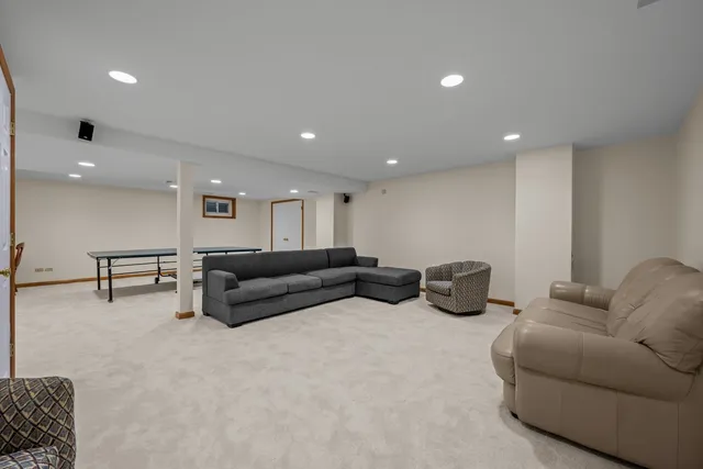 a living room with furniture and a couch