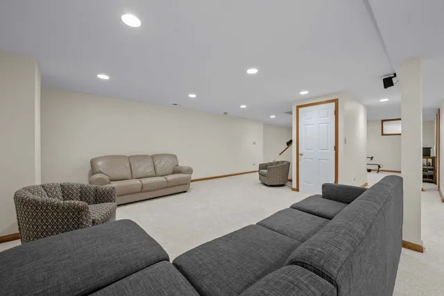 a living room with furniture and a couch