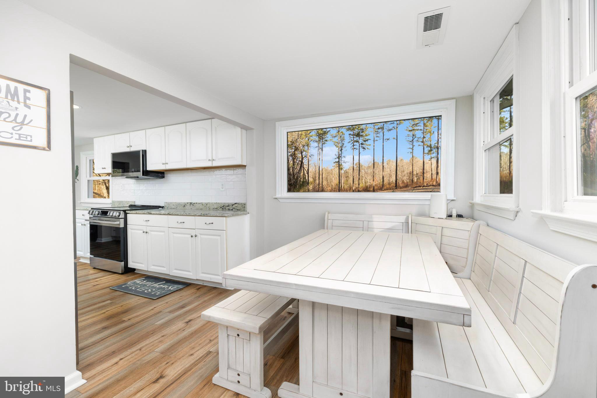 1052 South Hill Road Brodnax, VA 23920 - Photo 16 of 100 a kitchen with a sink appliances and cabinets