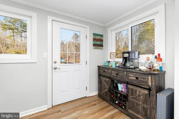 a kitchen with stainless steel appliances granite countertop a stove and a refrigerator