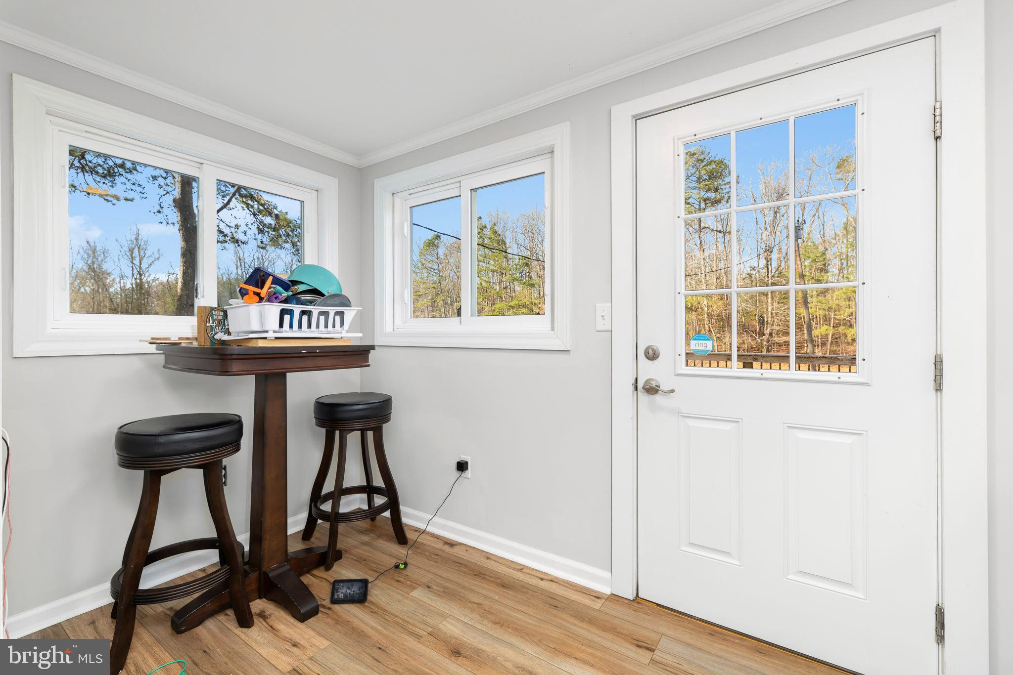 1052 South Hill Road Brodnax, VA 23920 - Photo 30 of 100 a view of a workspace with furniture and a window