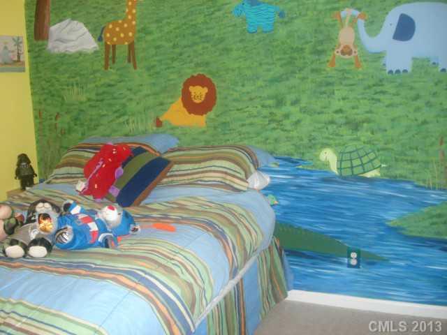 2080 Crescent Road Salisbury, NC 28146 - Photo 3 of 13 a bedroom with a bed and a painting on the wall