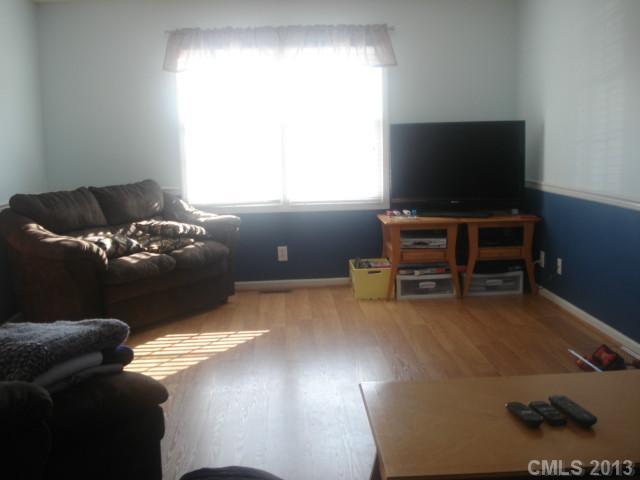 2080 Crescent Road Salisbury, NC 28146 - Photo 8 of 13 a living room with furniture and a flat screen tv