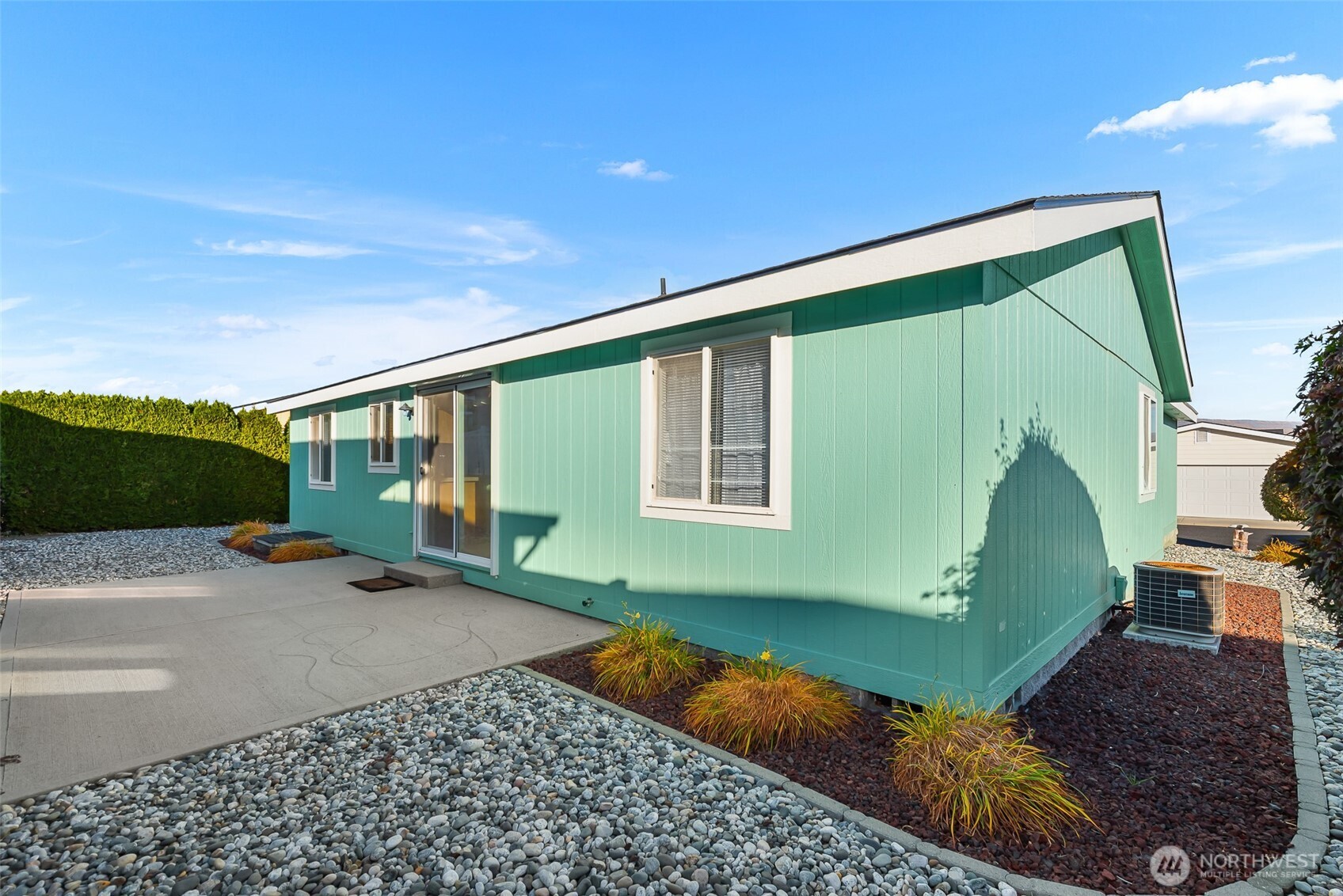 1232 Woods Street Wenatchee, WA 98801 - Photo 9 of 31 a view of a house with backyard and porch