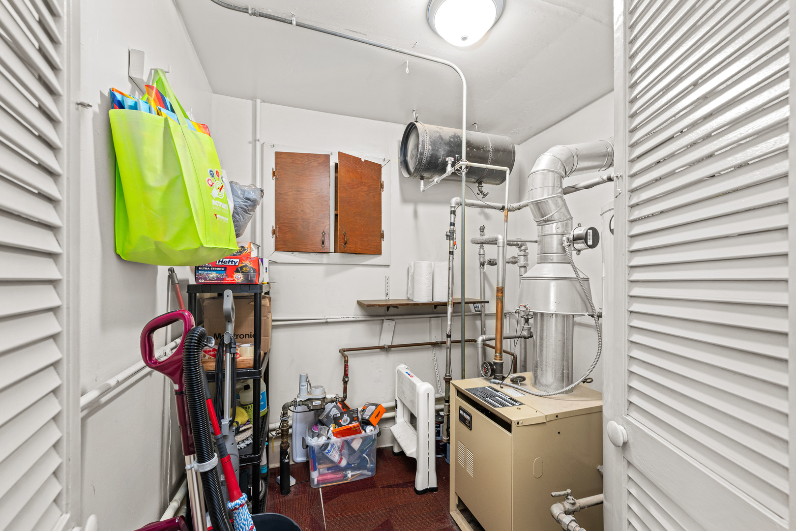 4101 5th Avenue East Moline, IL 61244 - Photo 30 of 36 a view of a storage and utility room with sink dryer and washer