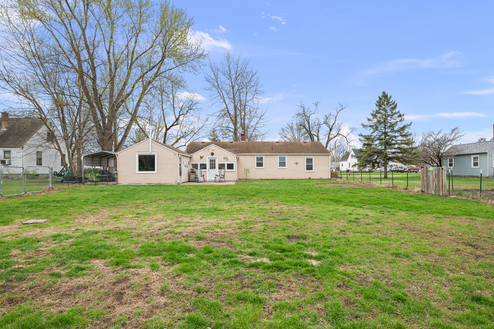 4101 5th Avenue East Moline, IL 61244 - Photo 10 of 36 a view of white house with a yard