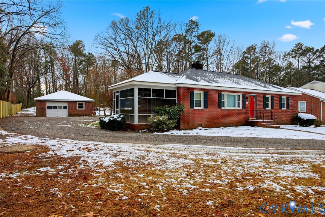 3225 Lakewood Road Glen Allen, VA 23060 - Photo 3 of 43 a front view of a house with a yard and trees