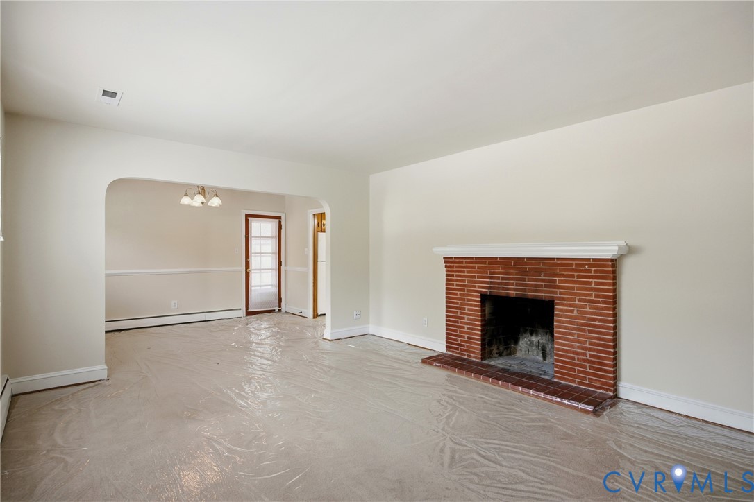 3225 Lakewood Road Glen Allen, VA 23060 - Photo 7 of 43 a view of an empty room with a fireplace