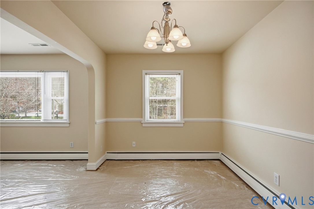 3225 Lakewood Road Glen Allen, VA 23060 - Photo 9 of 43 a view of a room with a window and chandelier