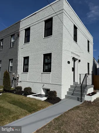 a front view of a house with garage