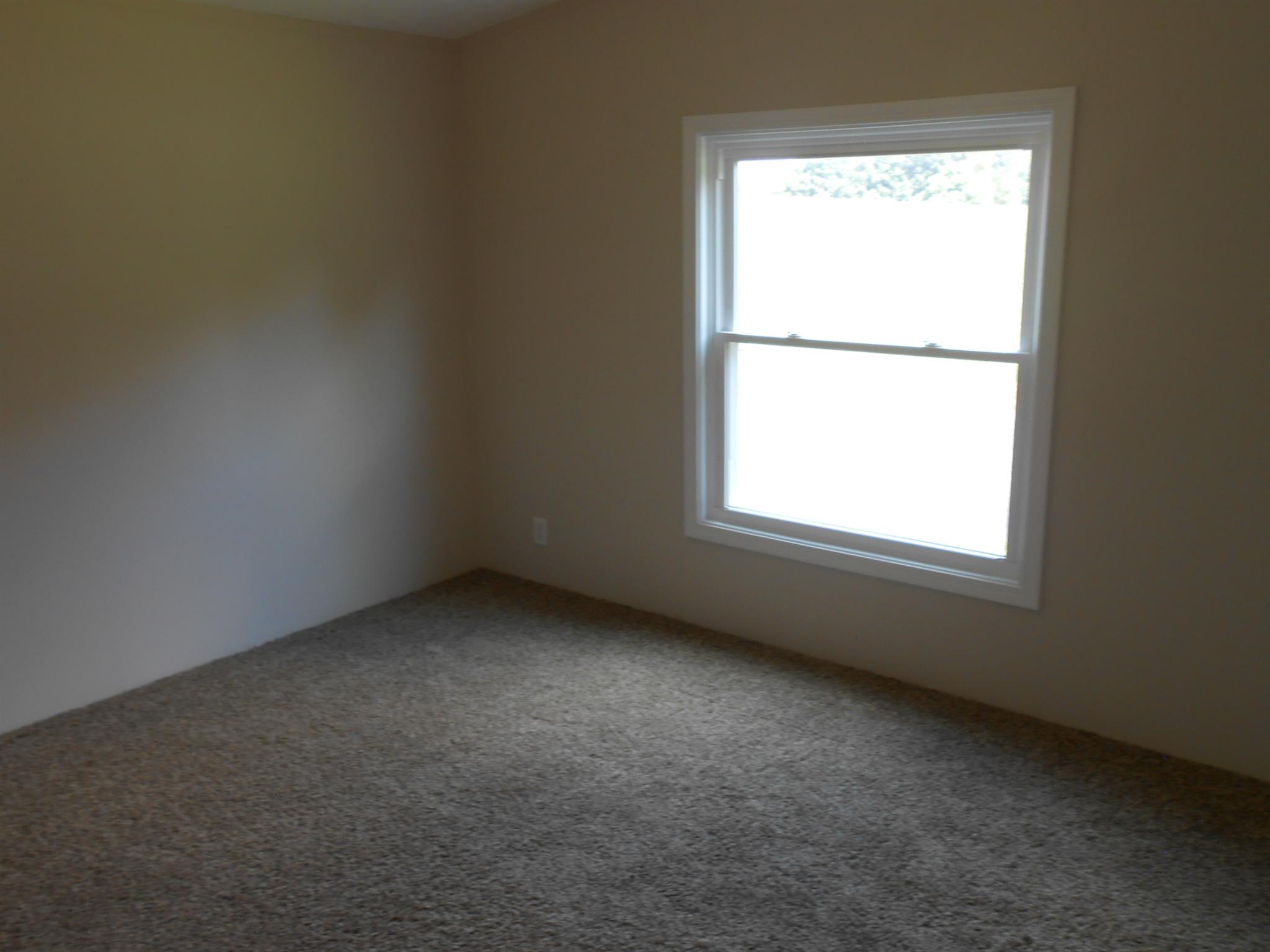 1225 Mt Vernon Road Bethpage, TN 37022 - Photo 13 of 15 an empty room with a window