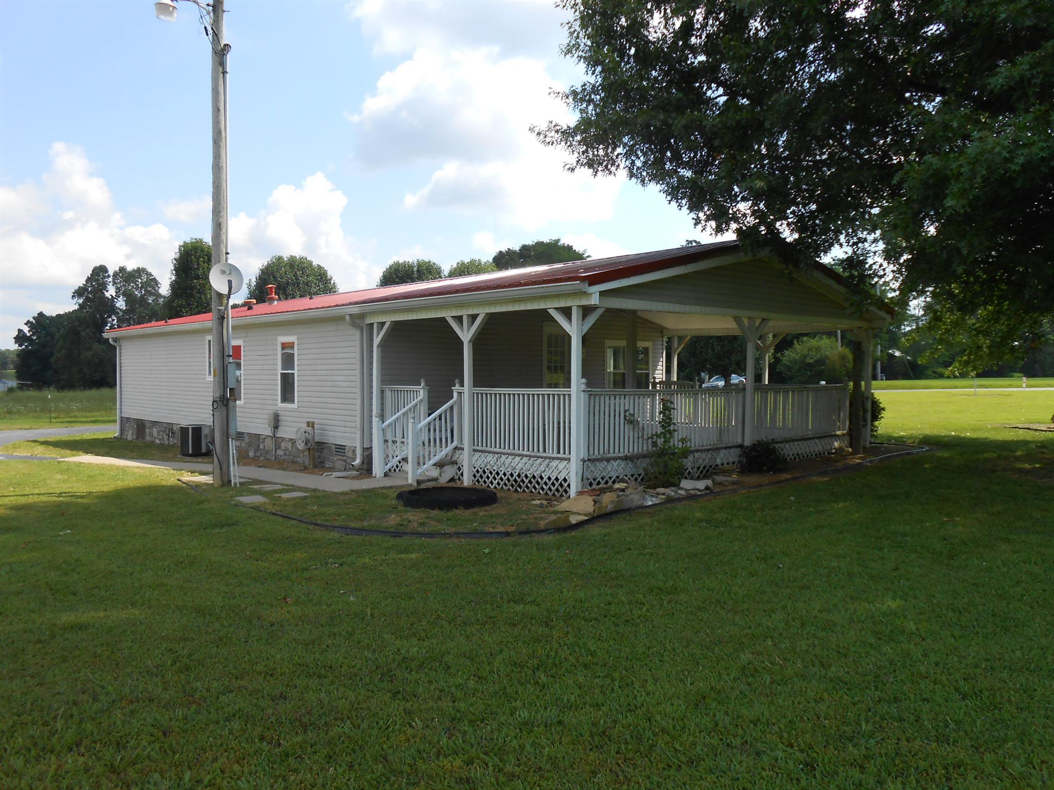 1225 Mt Vernon Road Bethpage, TN 37022 - Photo 4 of 15 a view of a house with a yard