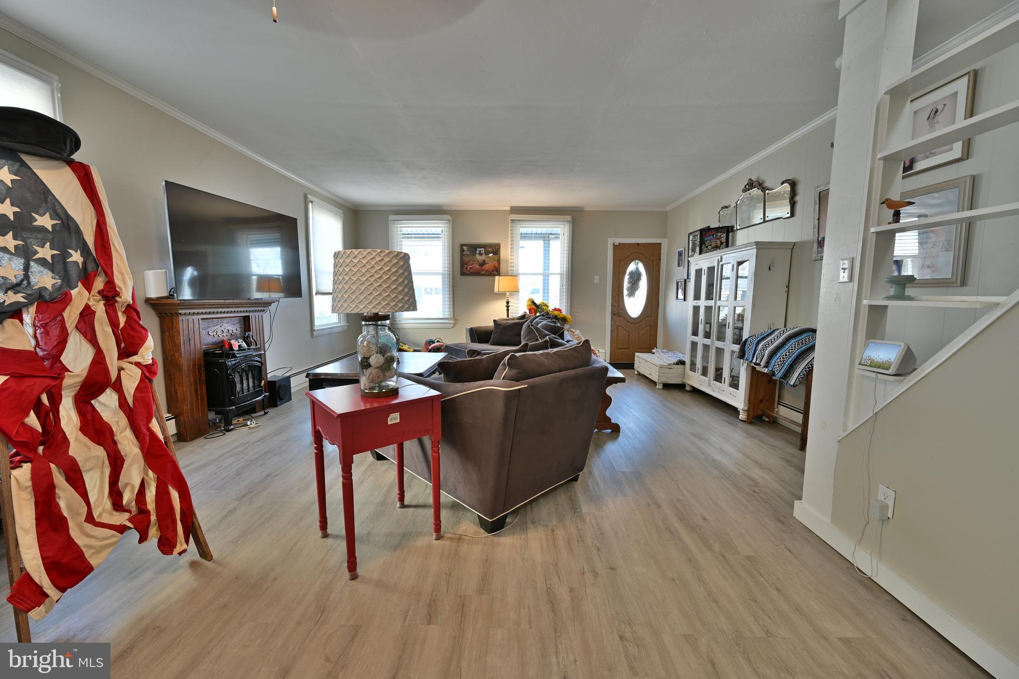 24734 East Main Street Columbus, NJ 08022 - Photo 6 of 24 a living room with furniture and a wooden floor