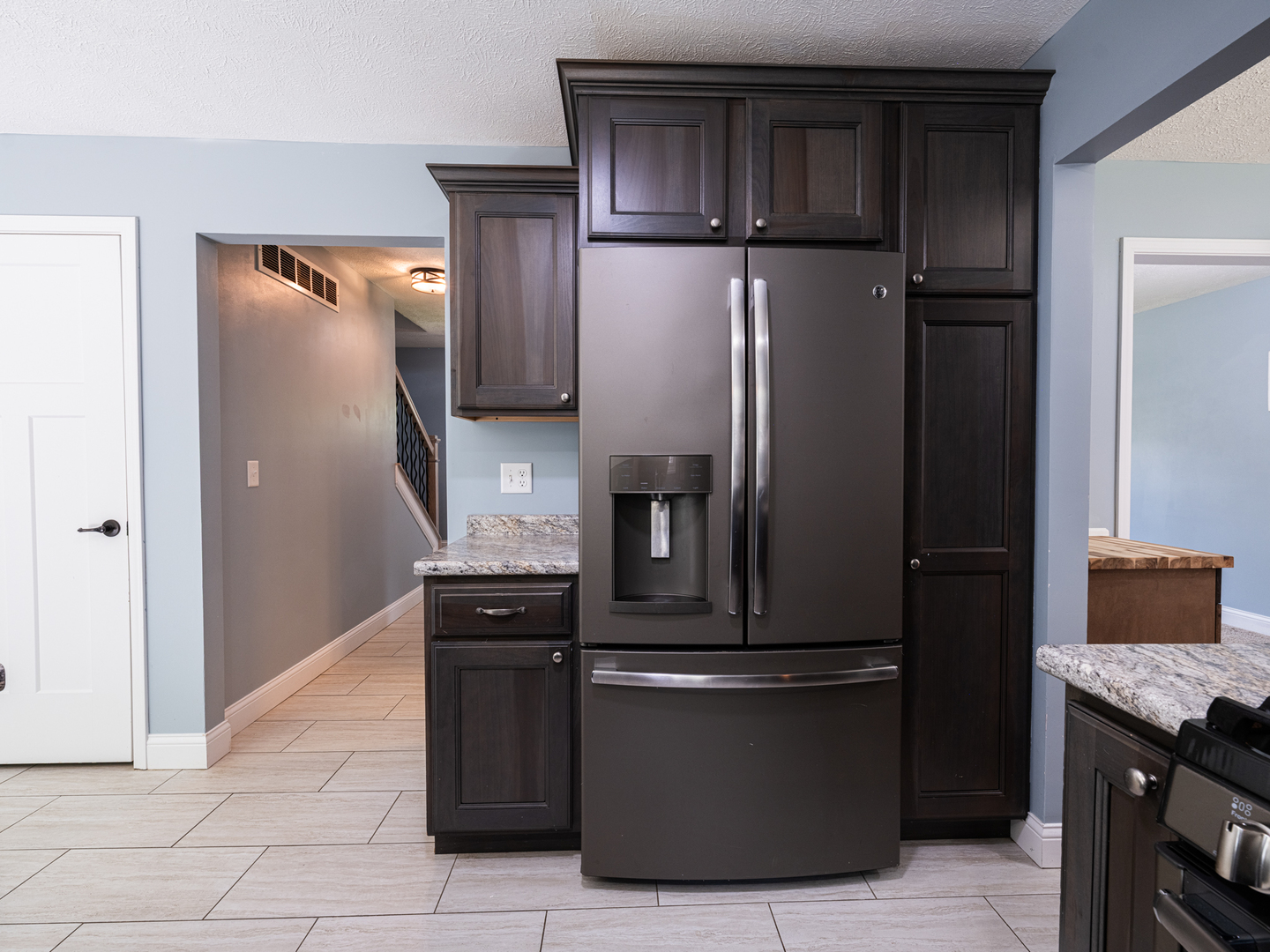 25 Greenbriar Road Mackinaw, IL 61755 - Photo 11 of 51 a kitchen with stainless steel appliances granite countertop a refrigerator and a stove