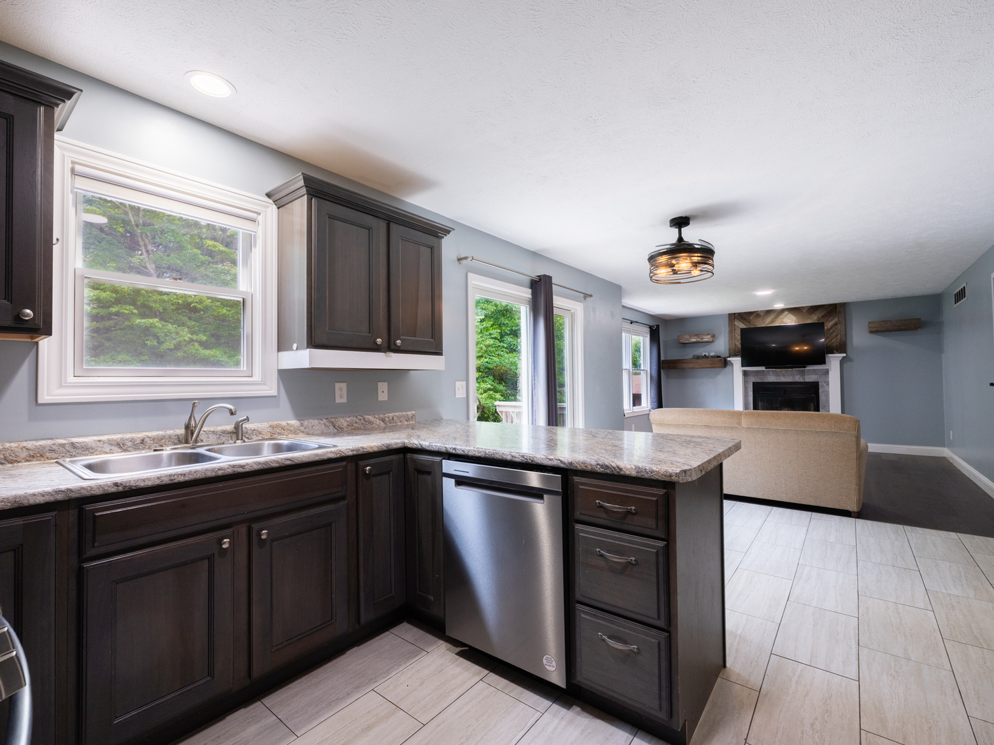 25 Greenbriar Road Mackinaw, IL 61755 - Photo 3 of 51 a kitchen with a sink stove and cabinets