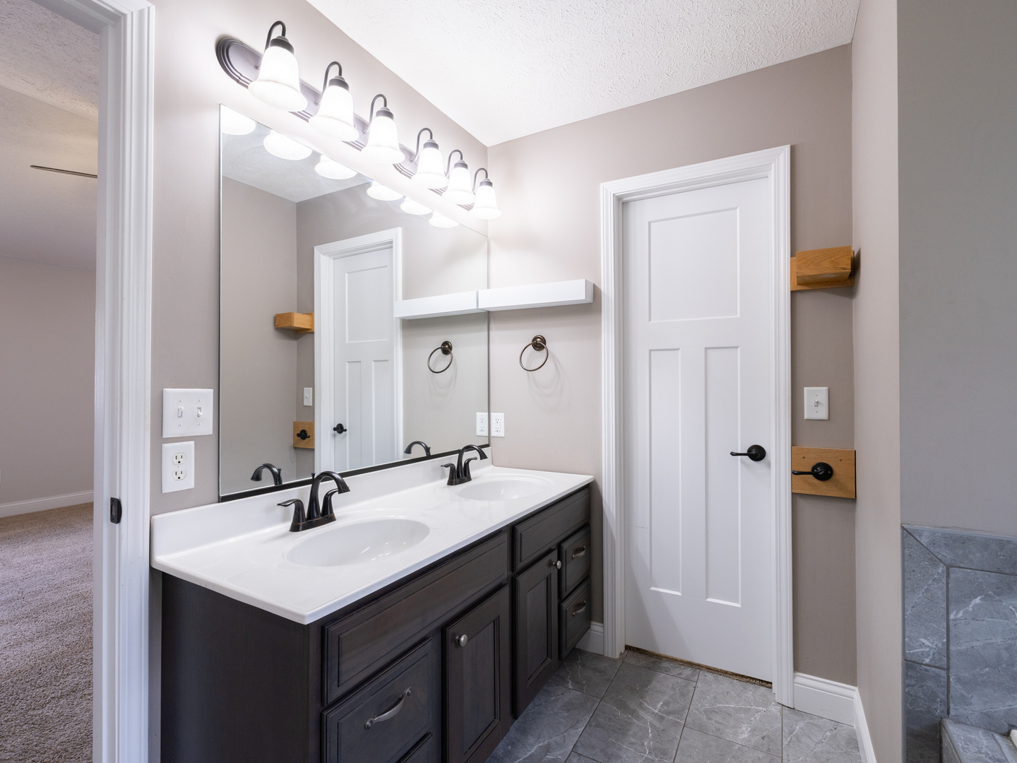 25 Greenbriar Road Mackinaw, IL 61755 - Photo 33 of 51 a bathroom with a sink vanity and a mirror