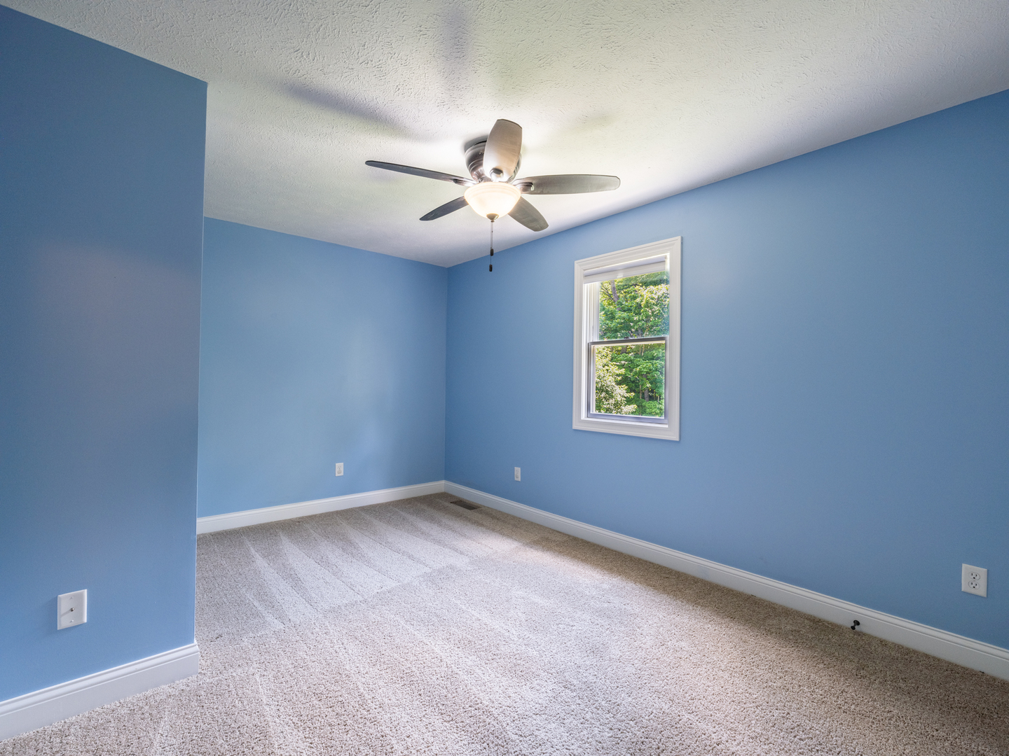 25 Greenbriar Road Mackinaw, IL 61755 - Photo 41 of 51 an empty room with windows and fan