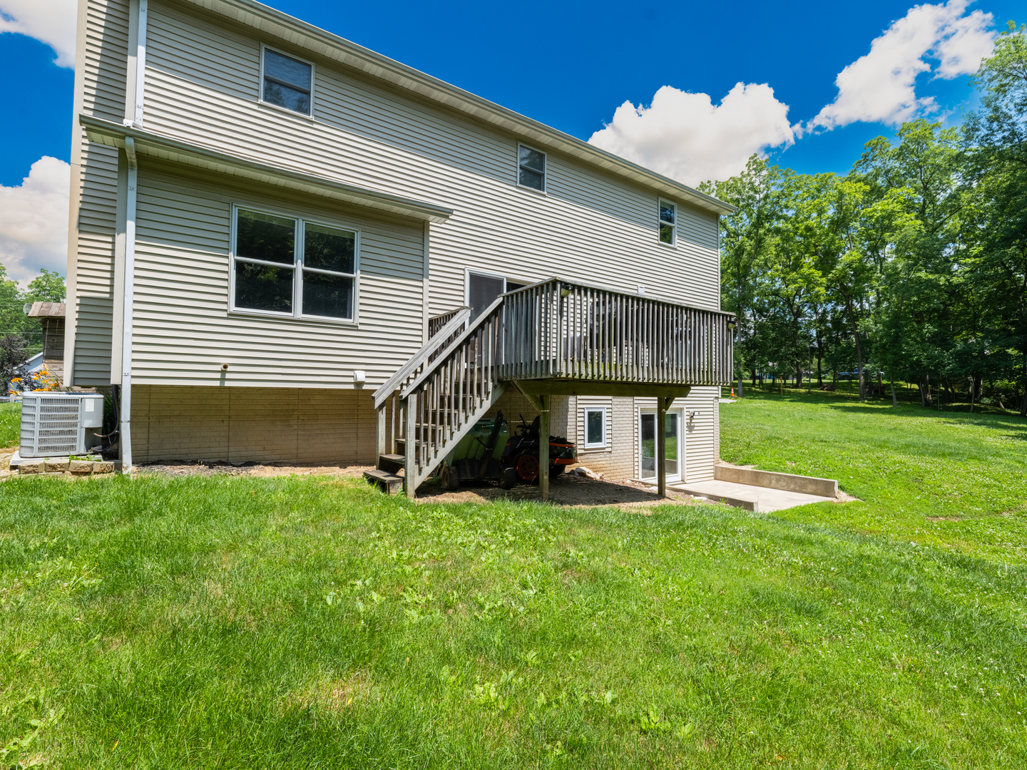 25 Greenbriar Road Mackinaw, IL 61755 - Photo 50 of 51 a view of a house with a yard and sitting area