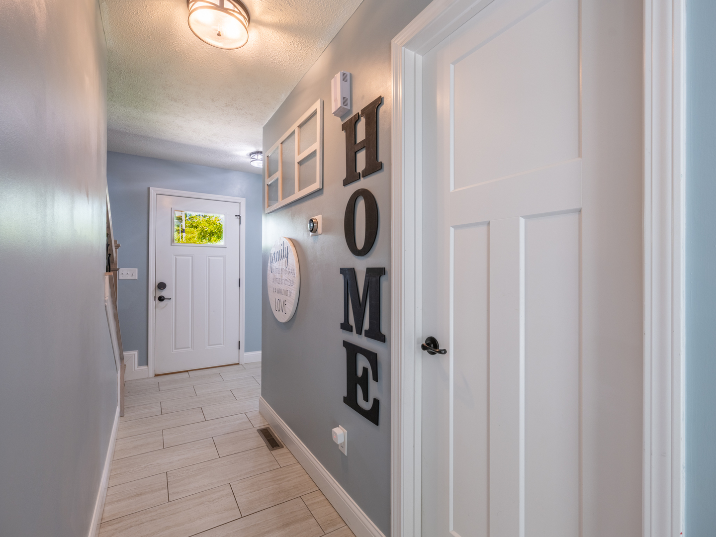25 Greenbriar Road Mackinaw, IL 61755 - Photo 6 of 51 a view of an entryway with wooden floor