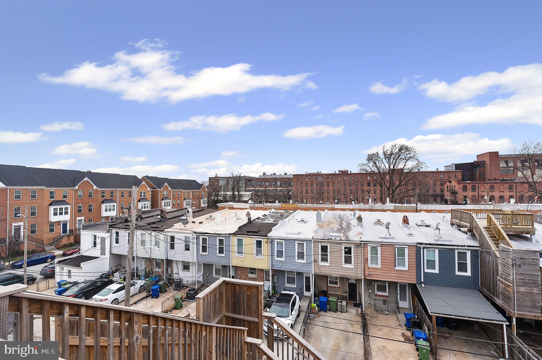 632 South Macon Street Baltimore, MD 21224 - Photo 14 of 20 a view of a buildings from a balcony