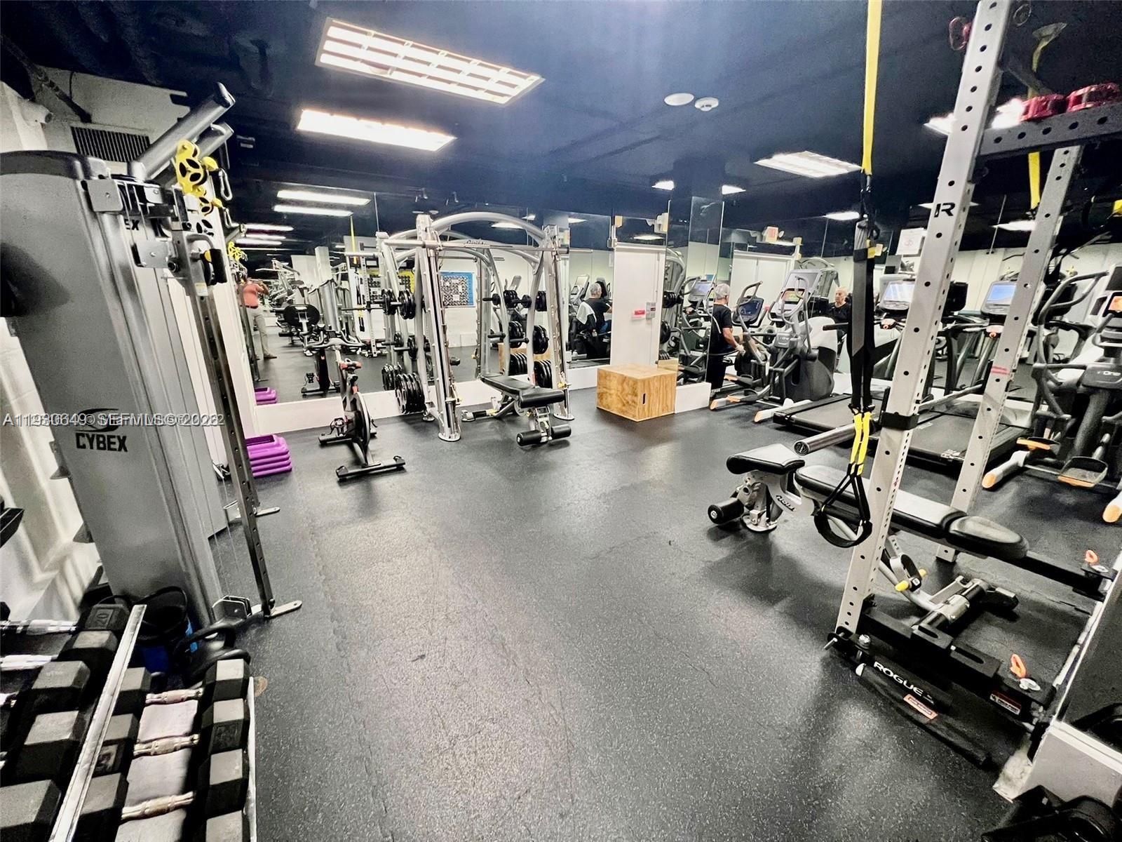 199 Ocean Ln Drive, Unit 102 Key Biscayne, FL 33149 - Photo 21 of 26 a view of a room with gym equipment