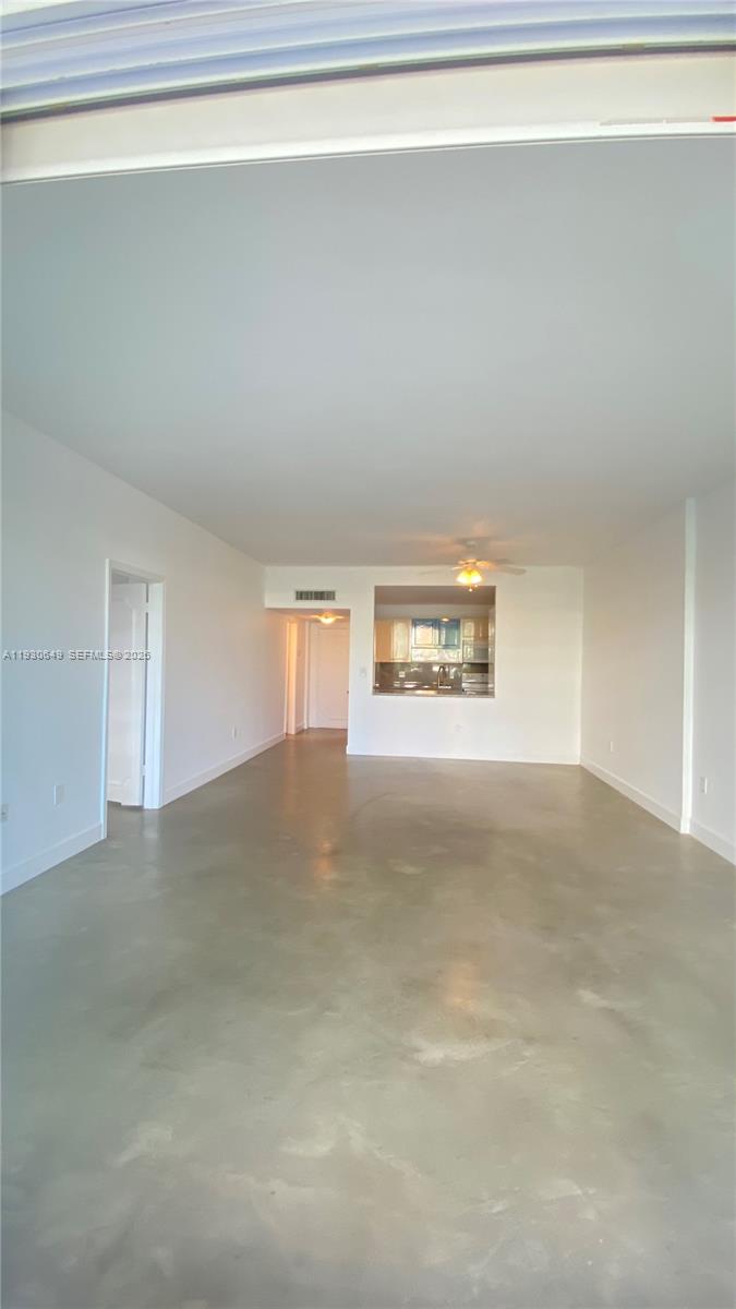 199 Ocean Ln Drive, Unit 102 Key Biscayne, FL 33149 - Photo 26 of 26 a view of a big room with an empty space