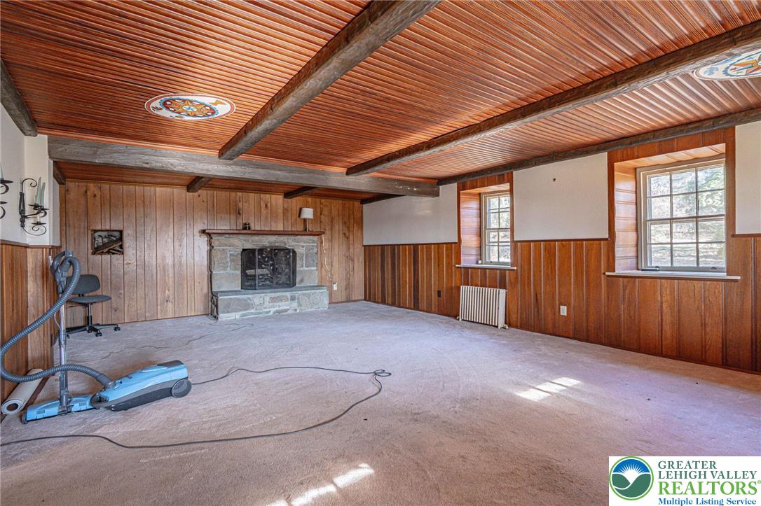 621 Nursery Road Kempton, PA 19529 - Photo 14 of 64 a view of an empty room with a fireplace