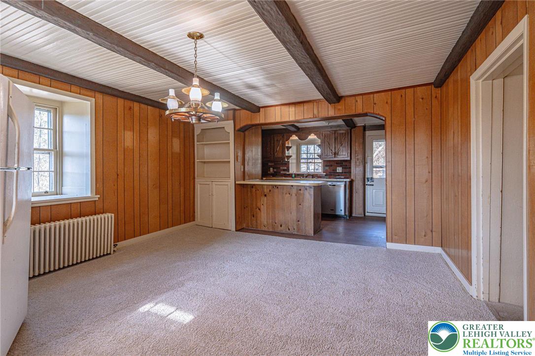 621 Nursery Road Kempton, PA 19529 - Photo 19 of 64 a view of a livingroom with a furniture wooden floor and windows