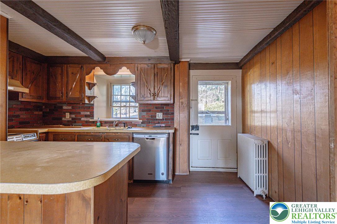 621 Nursery Road Kempton, PA 19529 - Photo 20 of 64 a kitchen with refrigerator and window