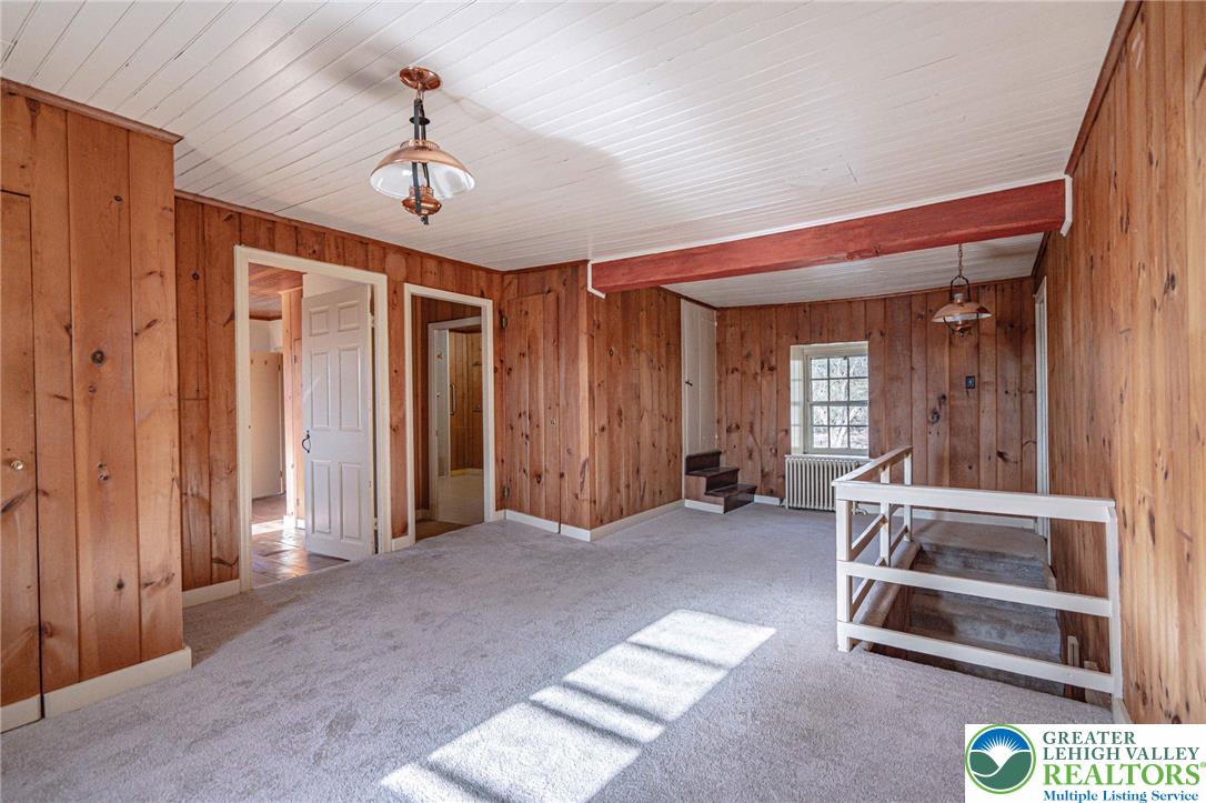 621 Nursery Road Kempton, PA 19529 - Photo 29 of 64 a living room with a ceiling fan and a rug