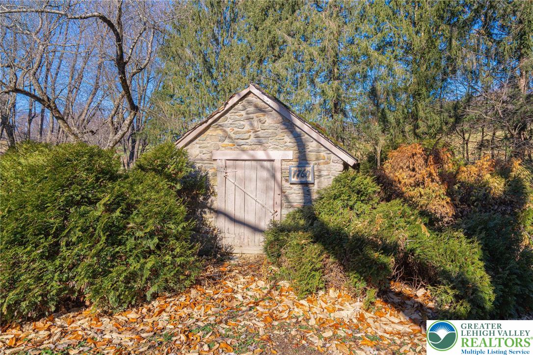 621 Nursery Road Kempton, PA 19529 - Photo 46 of 64 a backyard of a house with lots of green space