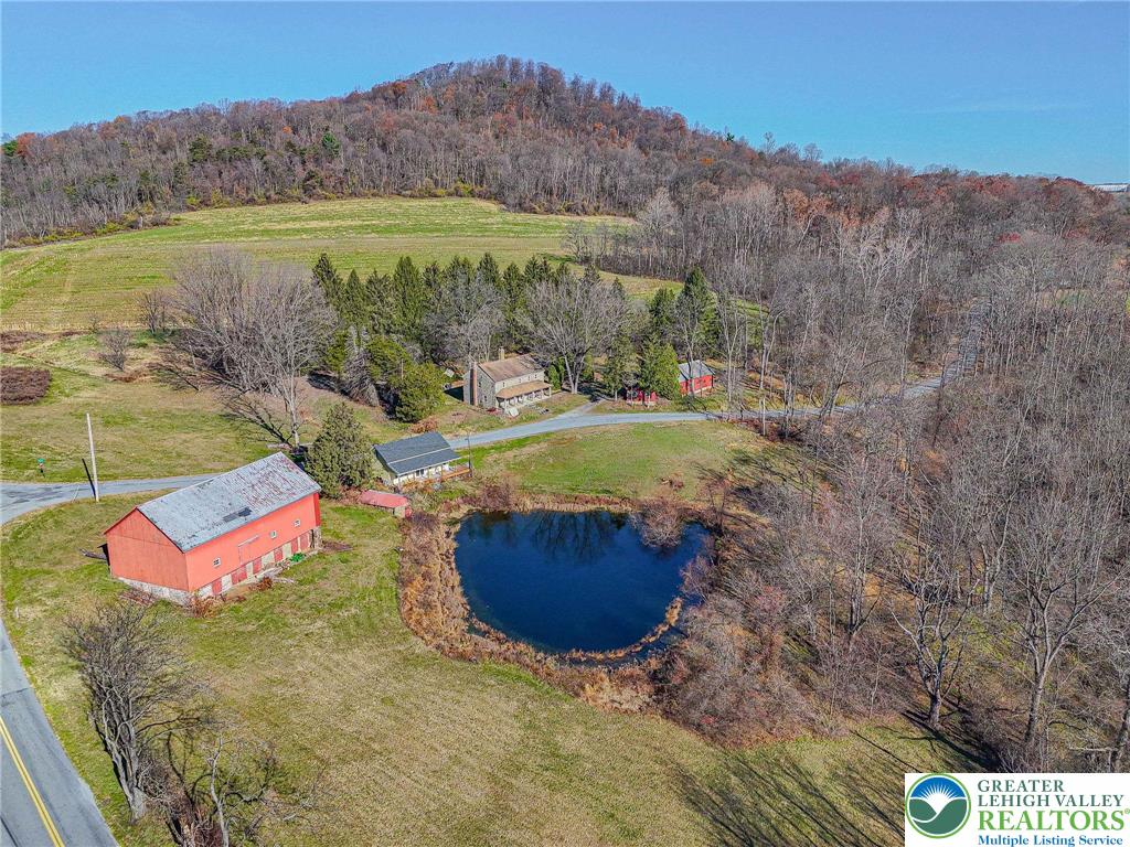 621 Nursery Road Kempton, PA 19529 - Photo 6 of 64 a view of a outdoor space with green field