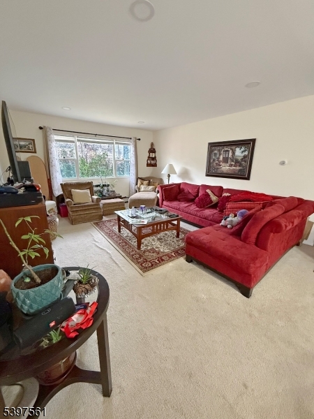 680 Highway 15 Lake Hopatcong, NJ 07849 - Photo 5 of 6 a living room with furniture and a window