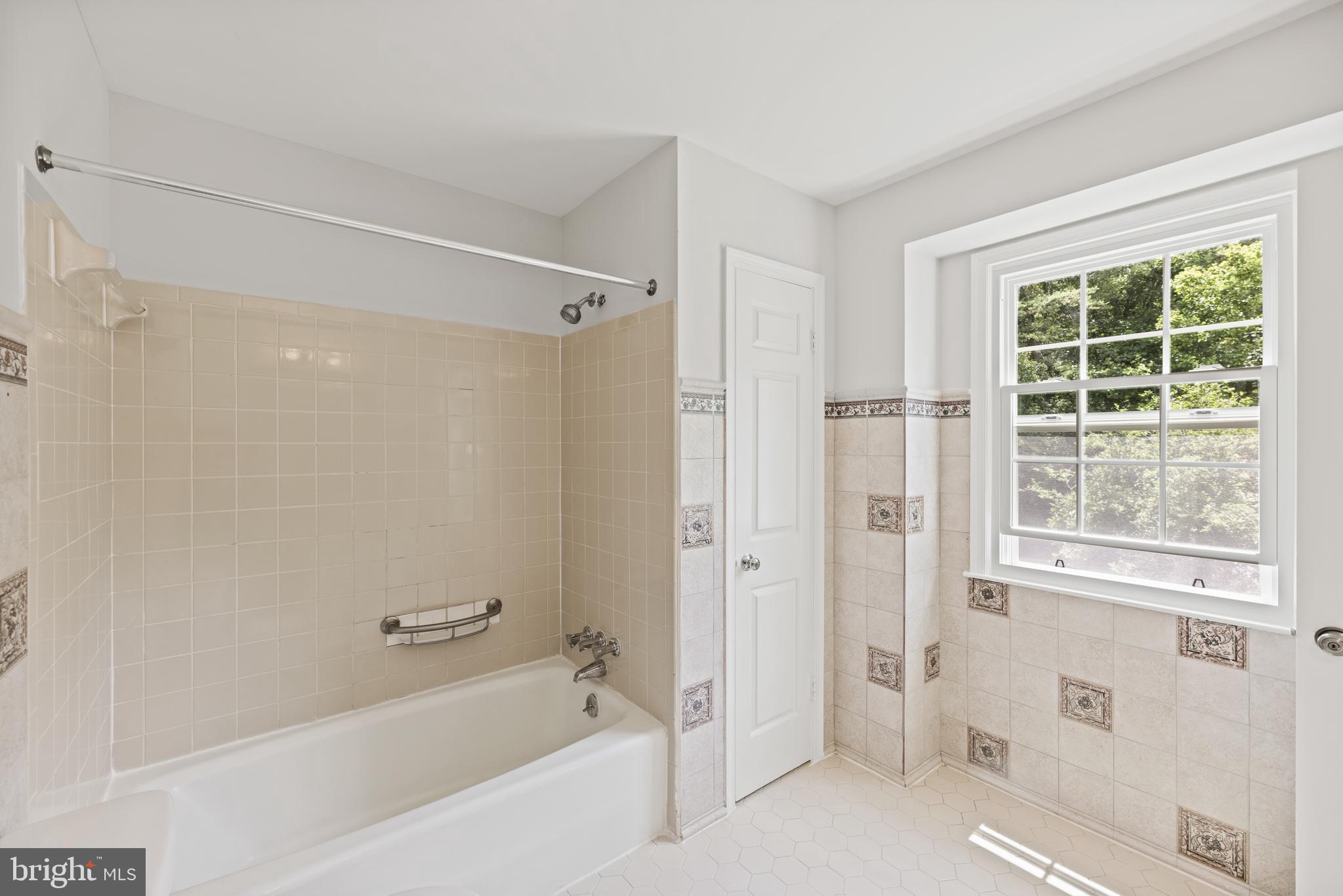 10906 Equestrian Court Reston, VA 20190 - Photo 23 of 36 Nice and bright primary bathroom.