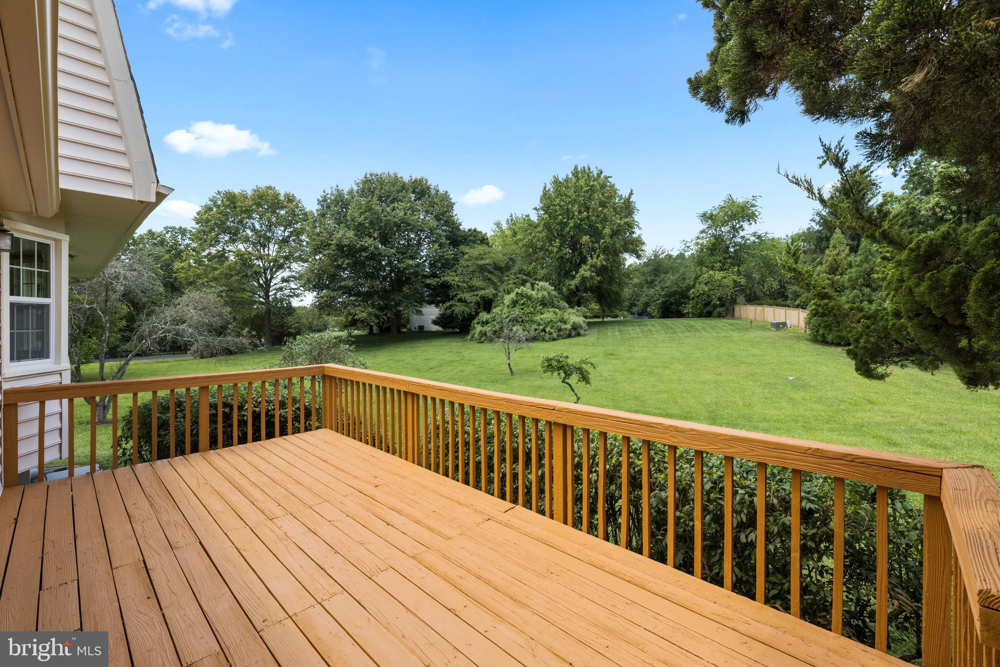 10906 Equestrian Court Reston, VA 20190 - Photo 31 of 36 The deck has an amazing view of the yard.