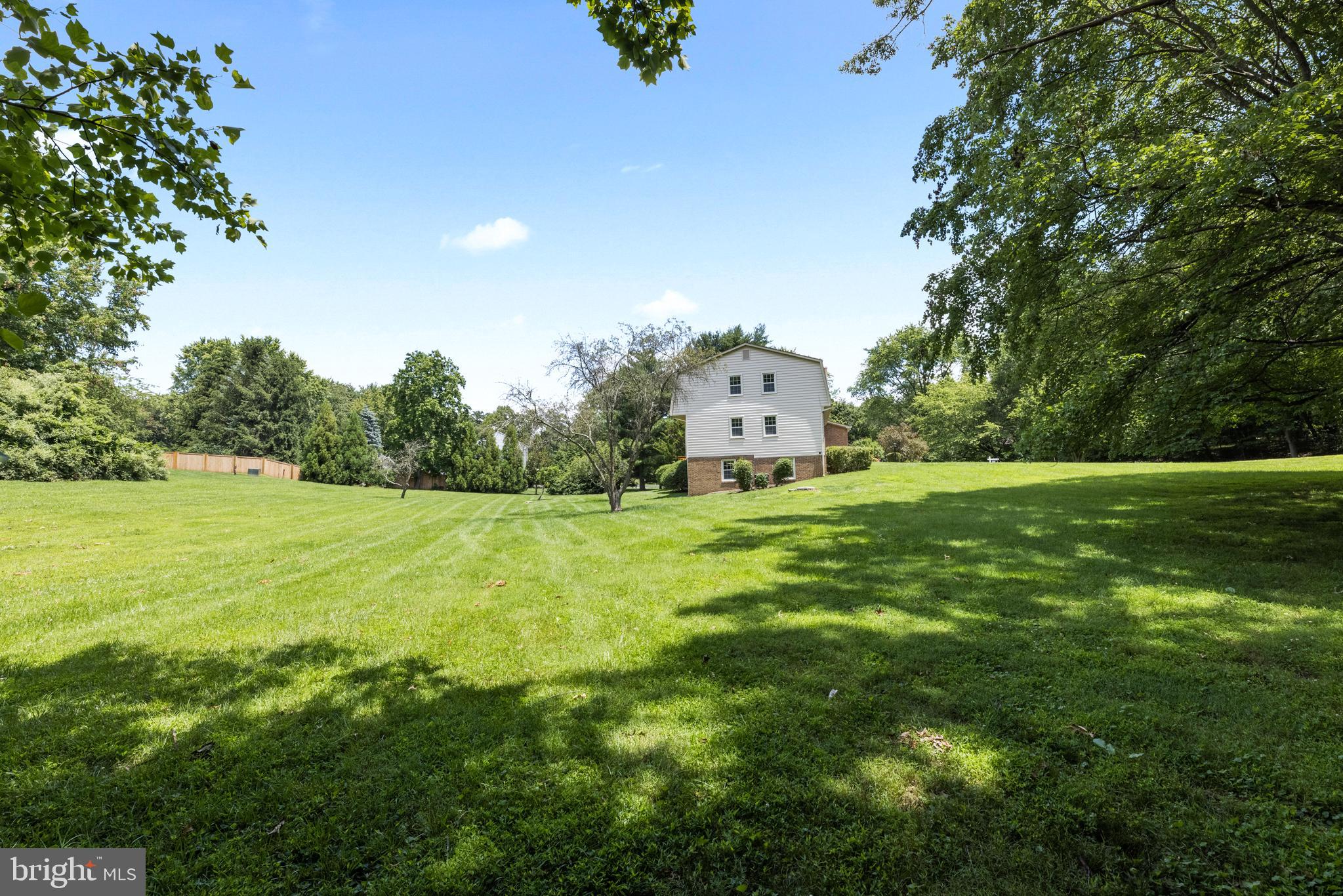10906 Equestrian Court Reston, VA 20190 - Photo 35 of 36 Nice wooded area provides privacy from road.