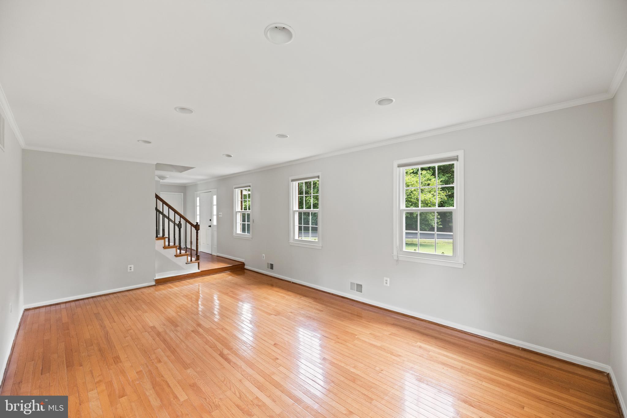 10906 Equestrian Court Reston, VA 20190 - Photo 5 of 36 Very large living room with lots of natural light.
