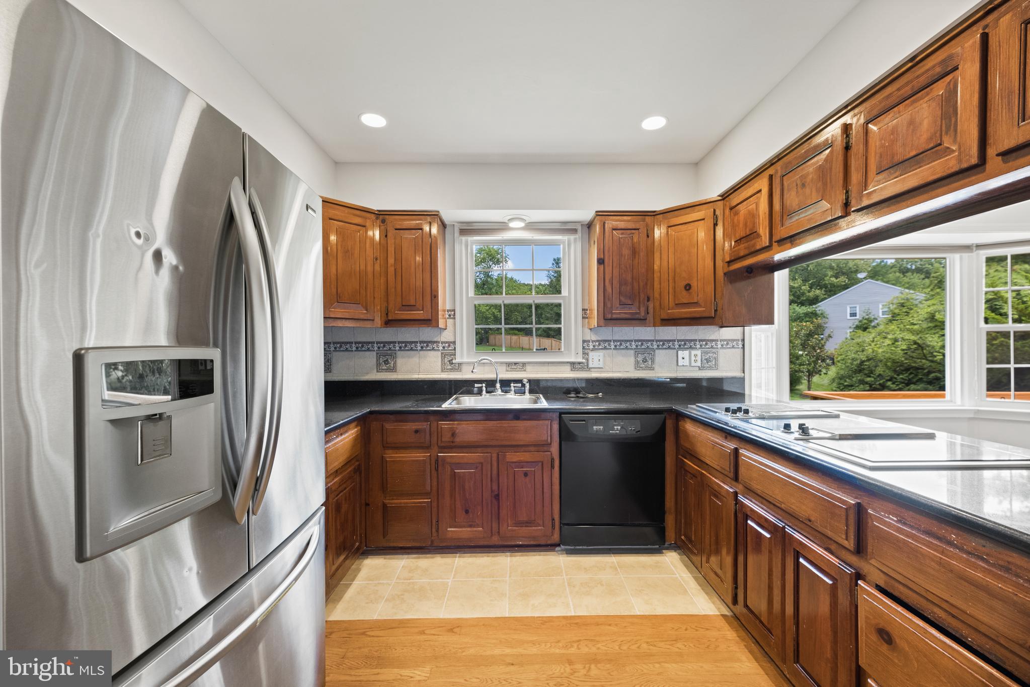 10906 Equestrian Court Reston, VA 20190 - Photo 9 of 36 Hardwood cabinets.