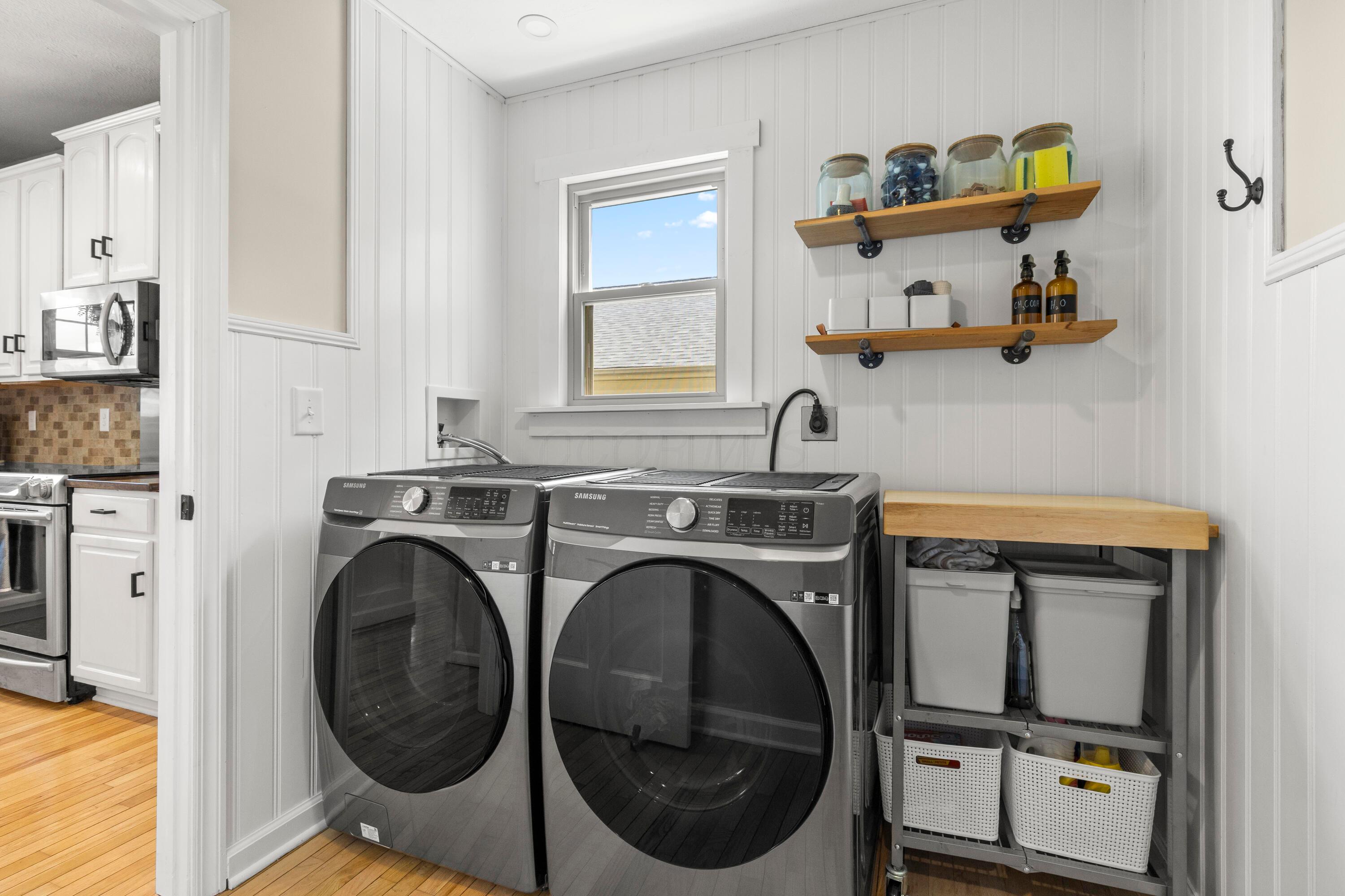 1515 Dale Ford Road Delaware, OH 43015 - Photo 30 of 74 • Hardwood flooring • Ivory painted & wainscoted walls • Electric dryer hookup • Washer & dryer are negotiable • Floating shelves • Hooks remain