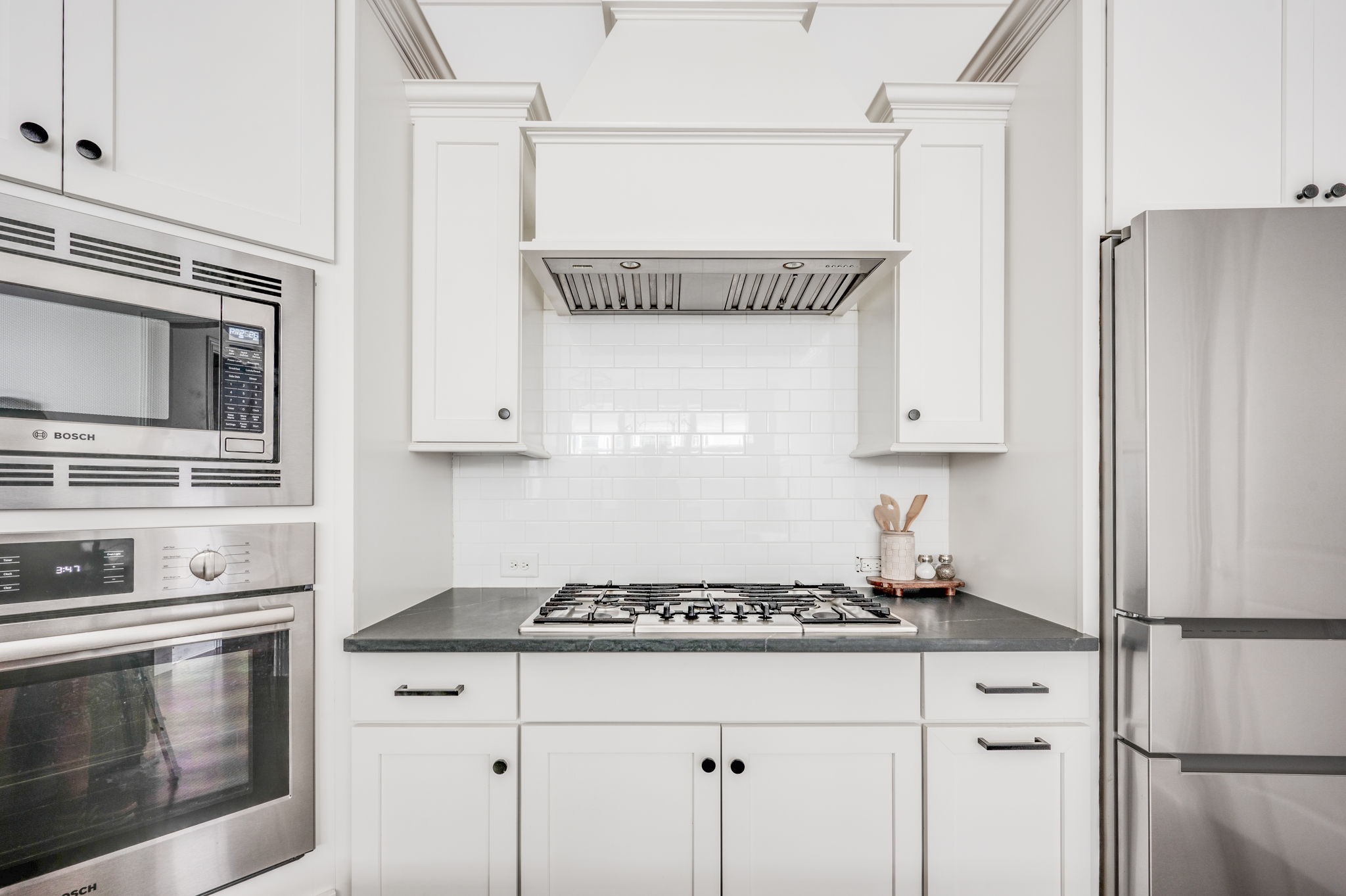 5144 Donovan Street Franklin, TN 37064 - Photo 21 of 52 a kitchen with a stove a refrigerator and cabinets