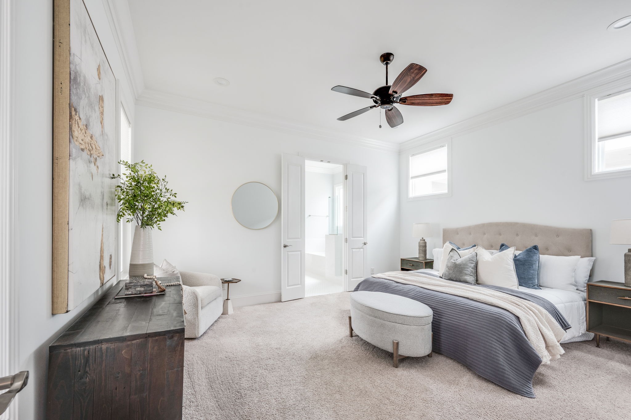 5144 Donovan Street Franklin, TN 37064 - Photo 27 of 52 a bedroom with a bed and a chandelier