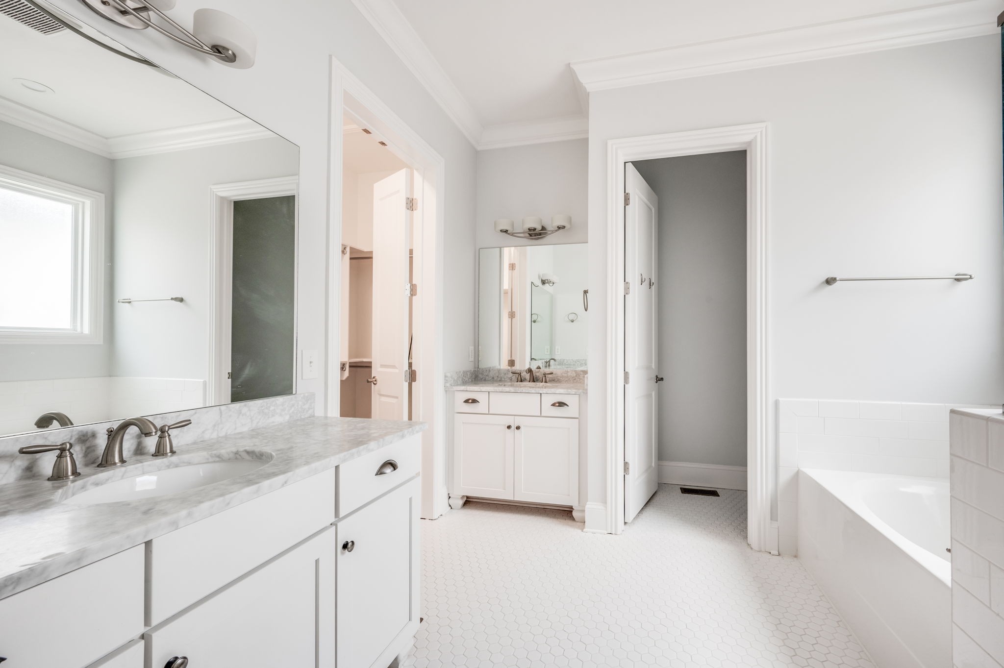 5144 Donovan Street Franklin, TN 37064 - Photo 30 of 52 a spacious bathroom with a granite countertop sink mirror and a