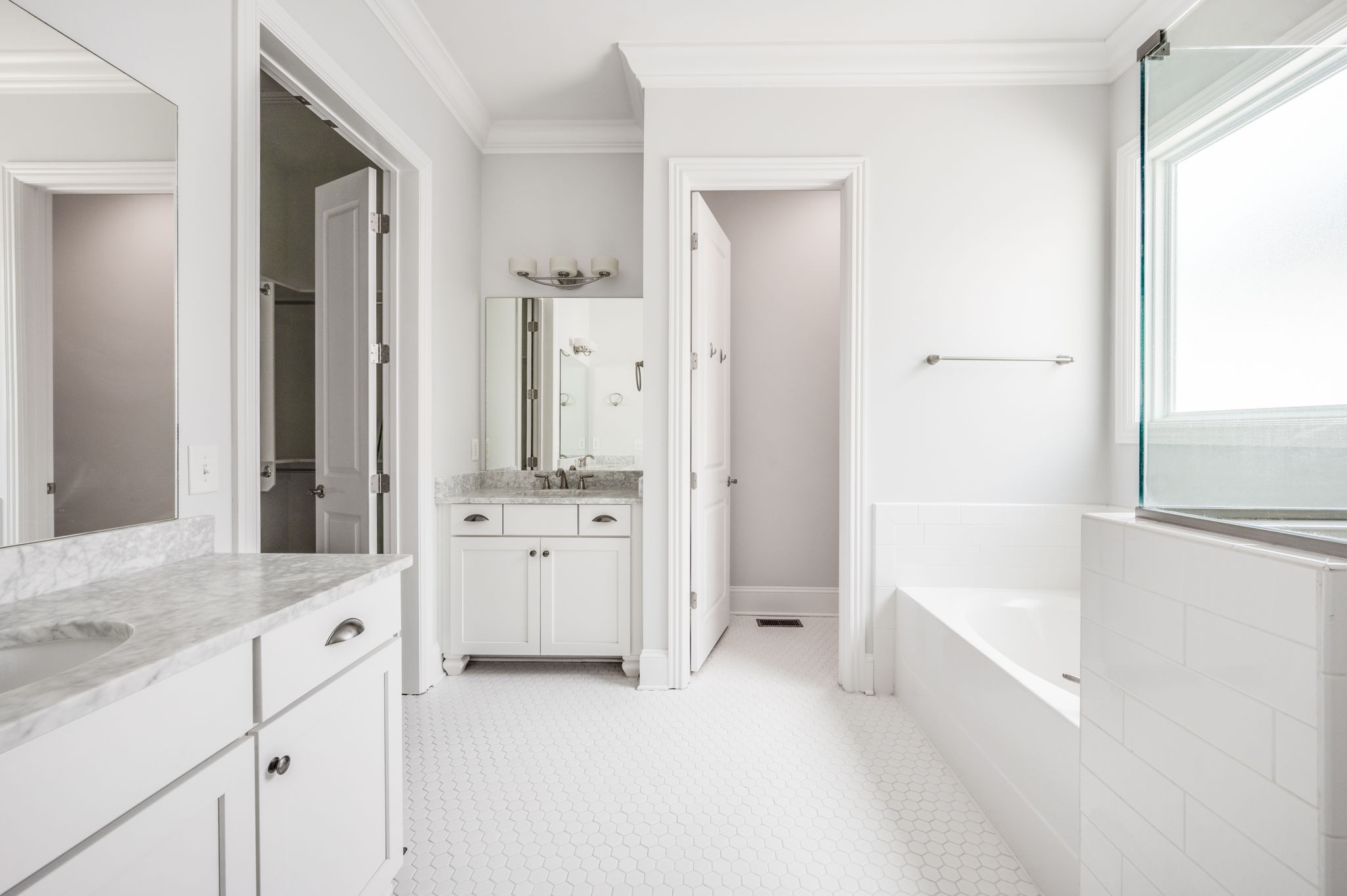 5144 Donovan Street Franklin, TN 37064 - Photo 33 of 52 a bathroom with a bathtub sink and mirror