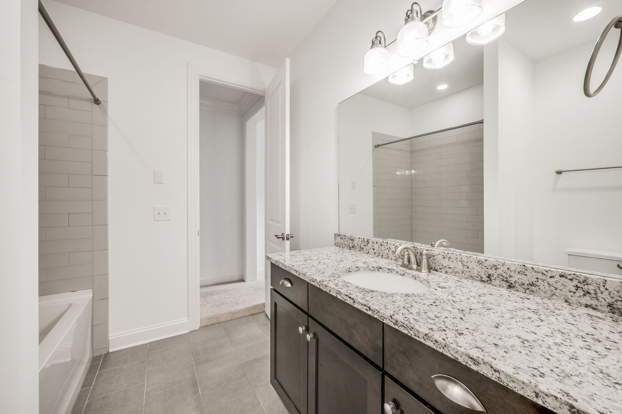5144 Donovan Street Franklin, TN 37064 - Photo 38 of 52 a bathroom with a sink and a mirror