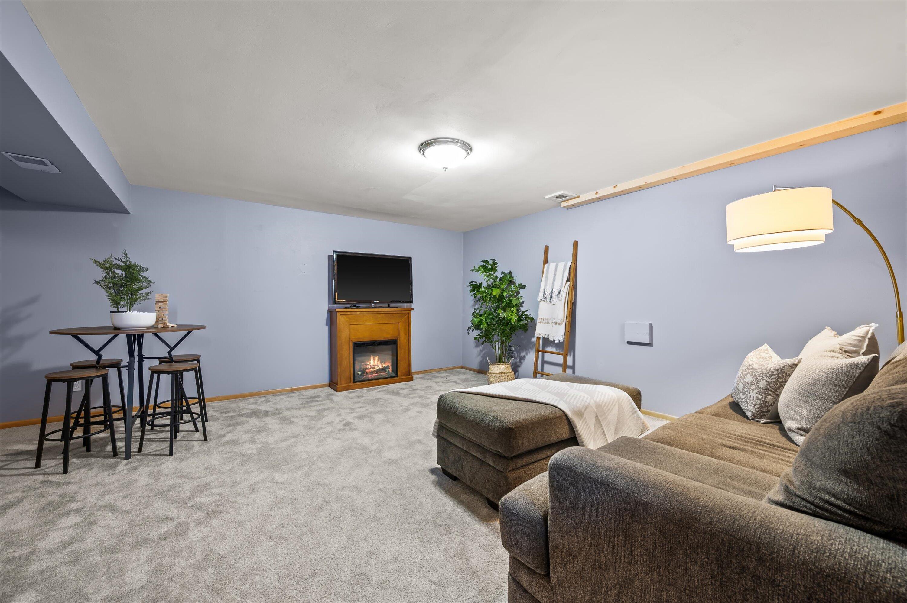 1130 Green Tree Road West Bend, WI 53090 - Photo 21 of 47 Lower Level Living Area